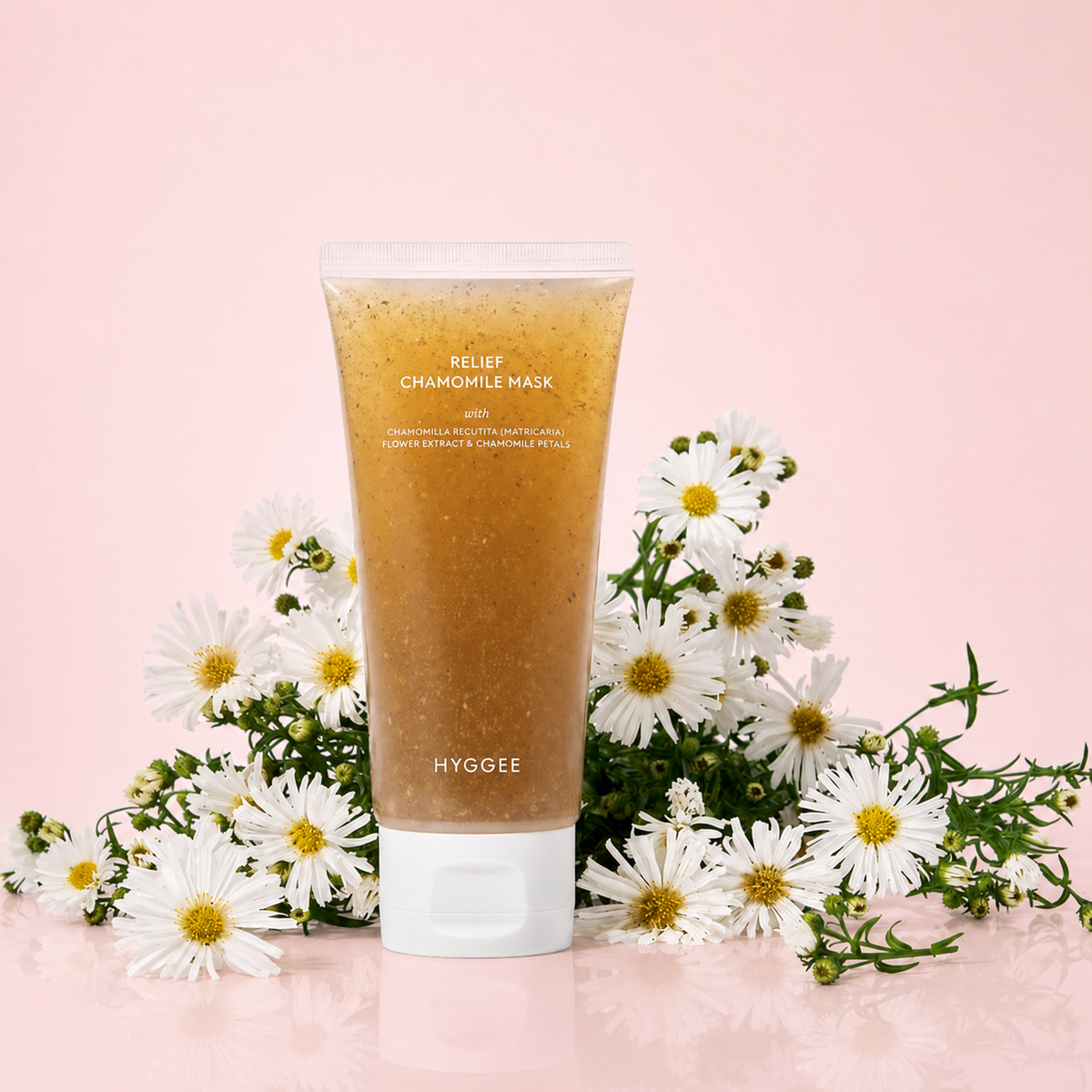 Hyggee Relief Chamomile Mask soothing face mask with chamomile extract and flower petals to calm sensitive skin and reduce redness.