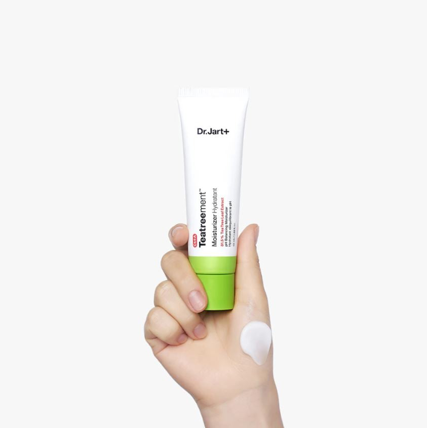 Person applying Dr.Jart+ CTRL-A Teatreement Moisturizer on face lightweight gel cream for acne prone skin