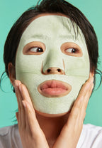 Dr.Jart+ Purifying Mud Sheet Mask applied on face for pore cleansing