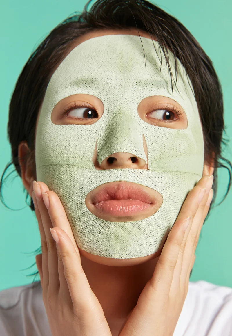 Dr.Jart+ Purifying Mud Sheet Mask applied on face for pore cleansing