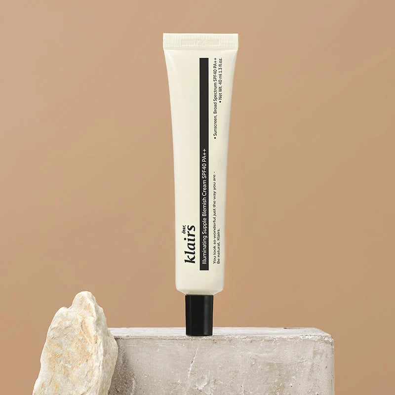 Klairs Illuminating Supple Blemish Cream SPF 40 on beige background