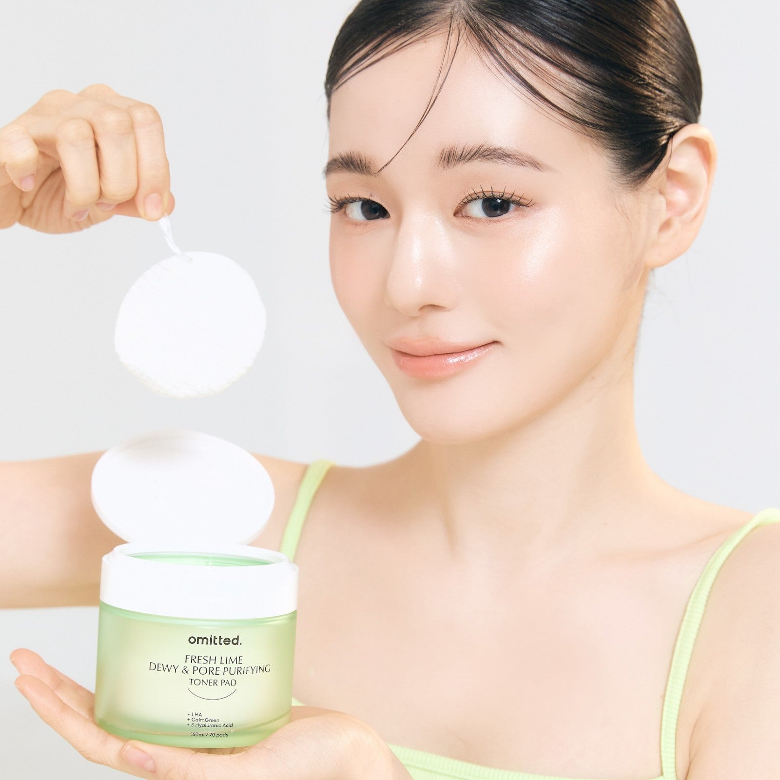 Glowgivande toner pads för kombinerad och oljig hud