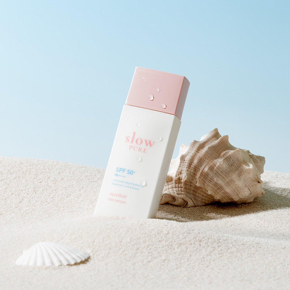 Slowpure Aqua Fluid Sun Serum SPF50+ utan vit hinna med osynlig finish perfekt under makeup