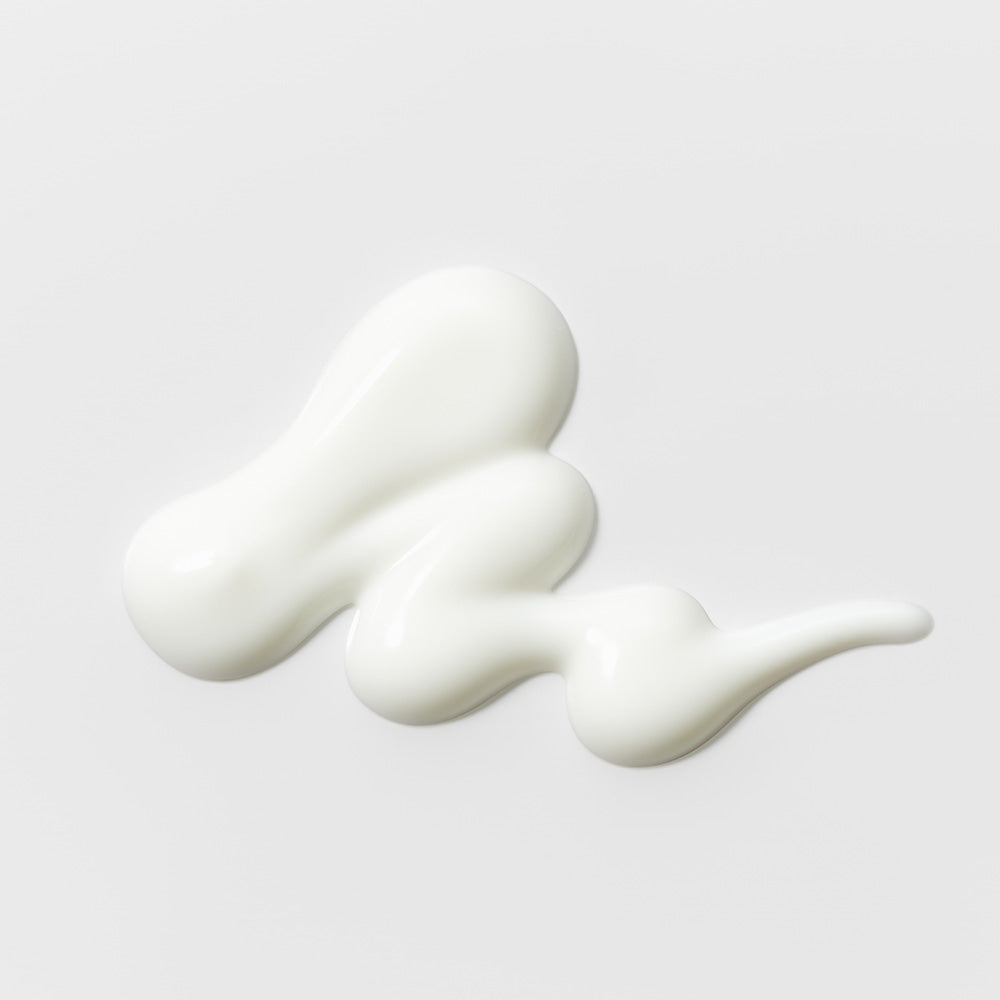 Slowpure Aqua Fluid Sun Serum lätt serumtextur med hyaluronsyra och ectoin som återfuktar huden utan kladd