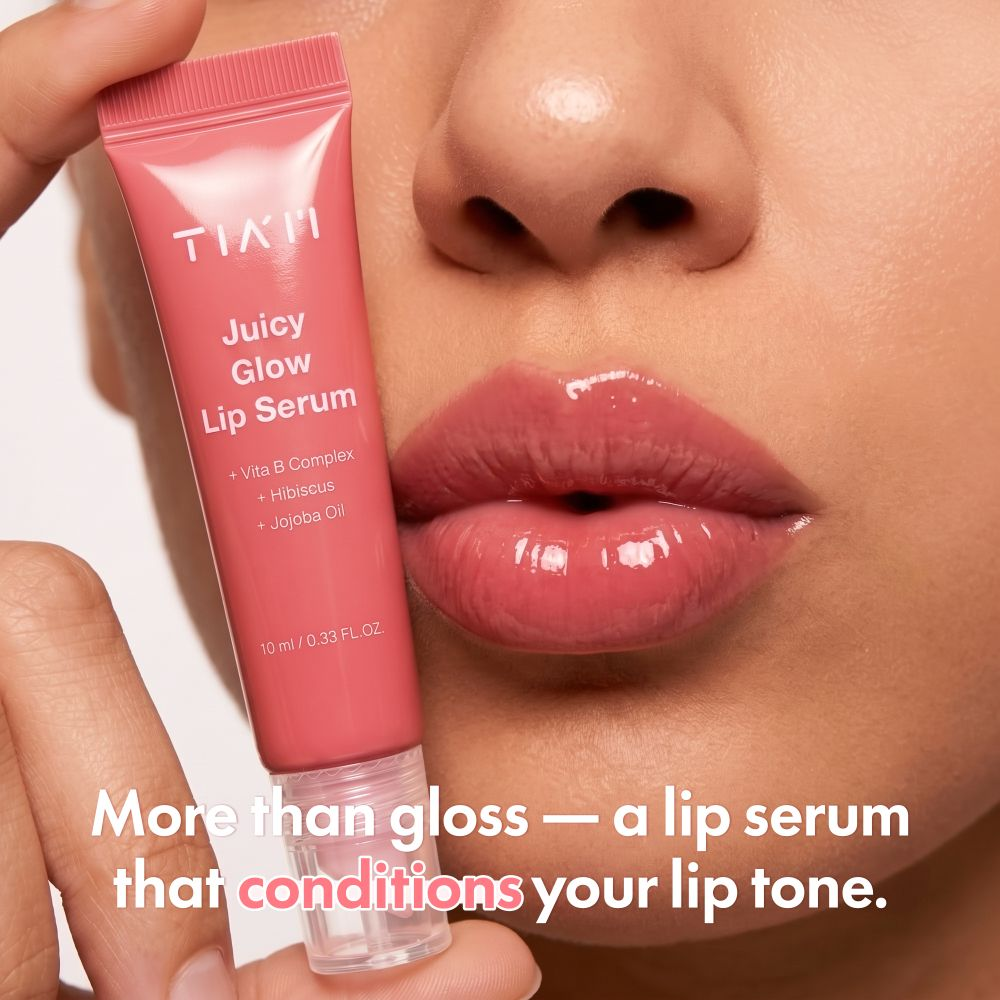 Model wearing rosy shine from TIAM Juicy Glow Lip Serum